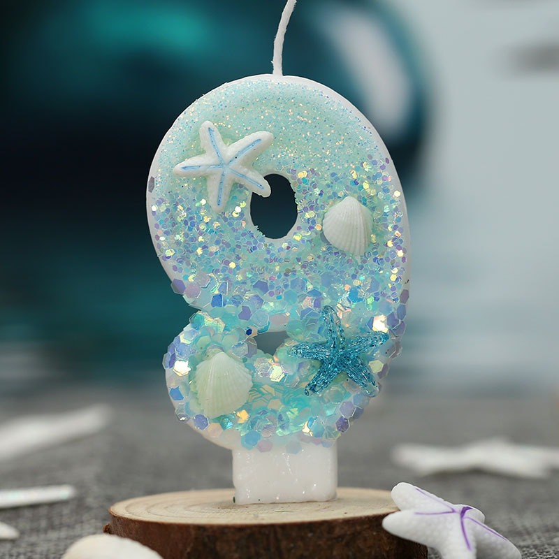 شموع أعياد الميلاد بتصميم صدف  - مراجعة Silk Candle وسعره